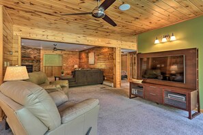 TV, fireplace, table football, books