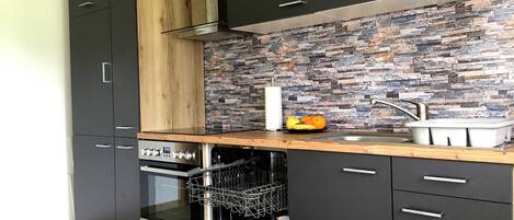 Réfrigérateur, four, lave-vaisselle, cafetiÚre/bouilloire