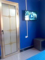 Executive Double Room | Minibar, individually decorated, desk, laptop workspace