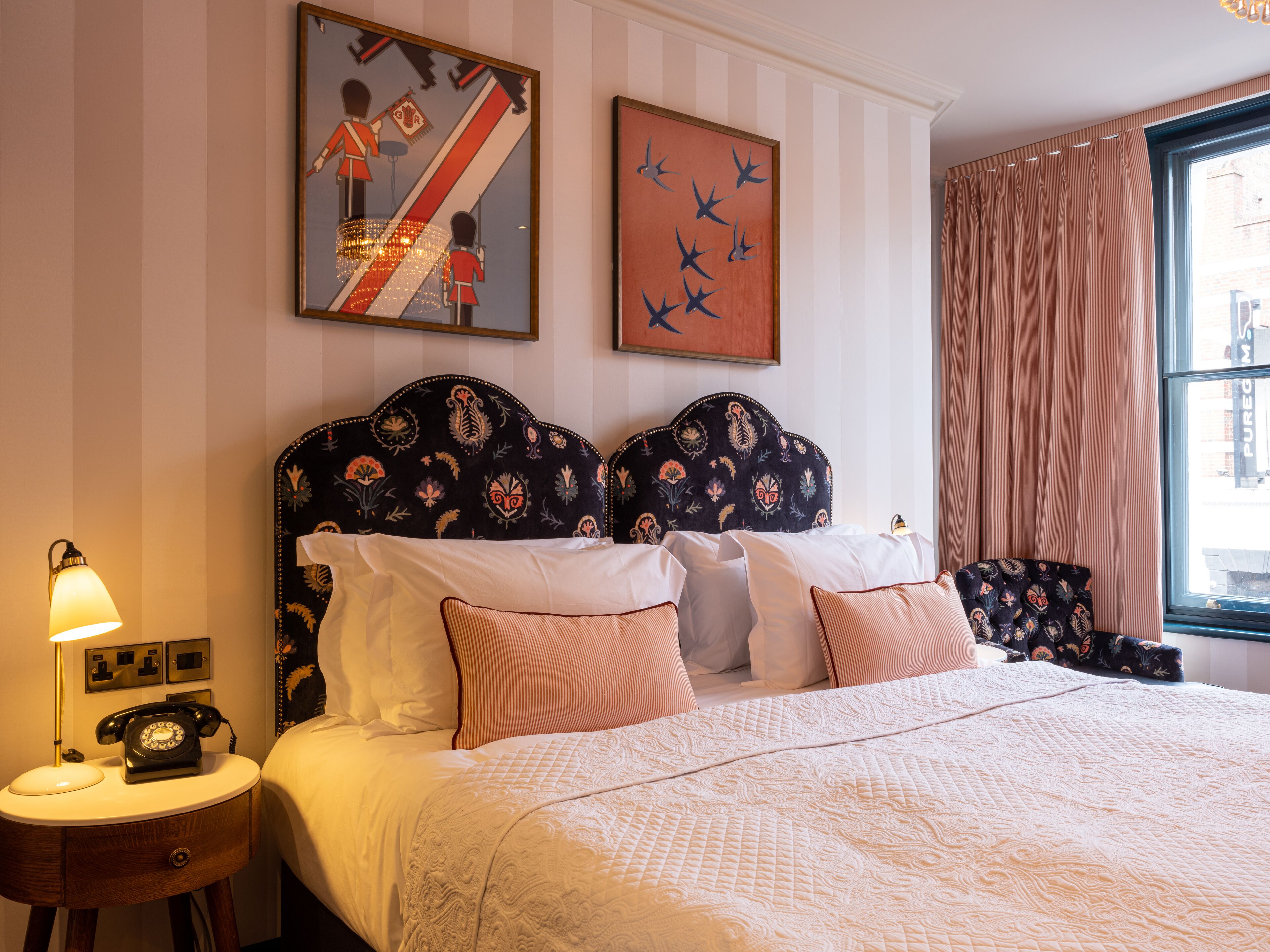 deluxe double room | minibar, in-room safe, desk, iron/ironing board