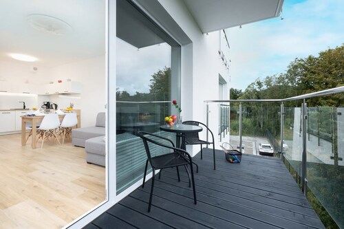 Bright Apartment | 200 m to the Beach, Balcony with a View