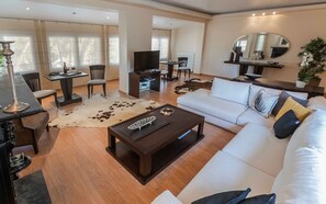 Design Villa | Living area | 42-inch Smart TV with digital channels, TV, fireplace - Danai's Secluded Paradise - Azure Coastal Dreams (Kassandra)