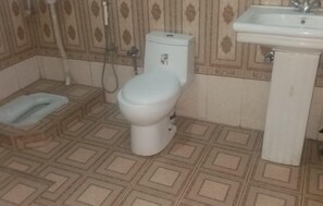 Shower, free toiletries, slippers, towels