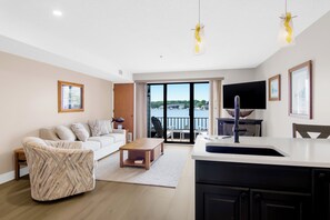 Smart TV, fireplace - 112 EWI Lake Charlevoix View Condo | Pool, Hot Tub, Sauna | Fireplace (Charlevoix)
