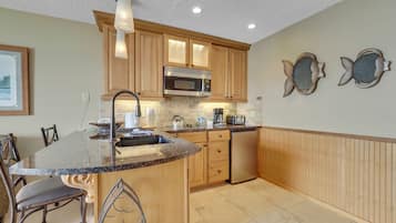 Fridge, microwave, stovetop, coffee/tea maker