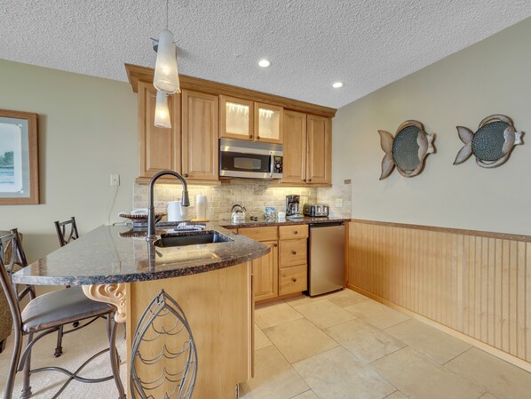 Fridge, microwave, stovetop, coffee/tea maker