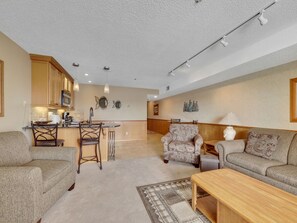 Smart TV, fireplace - 112 EWI Lake Charlevoix View Condo | Pool, Hot Tub, Sauna | Fireplace (Charlevoix)