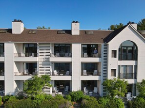 Exterior - Edgewater #119 | Water Views + Private Balcony | Pool, Hot Tub, Sauna | Patio (Charlevoix)