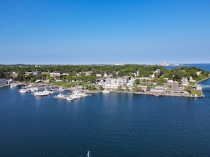 Stunning coastal town with a marina, church spire, and scenic waterfront.