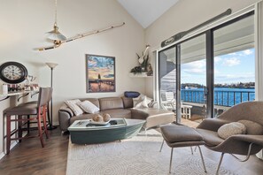 Smart TV, fireplace - Spacious Lake Charlevoix Condo | Downtown Charlevoix | Pool, Hot Tub, Sauna (Charlevoix)