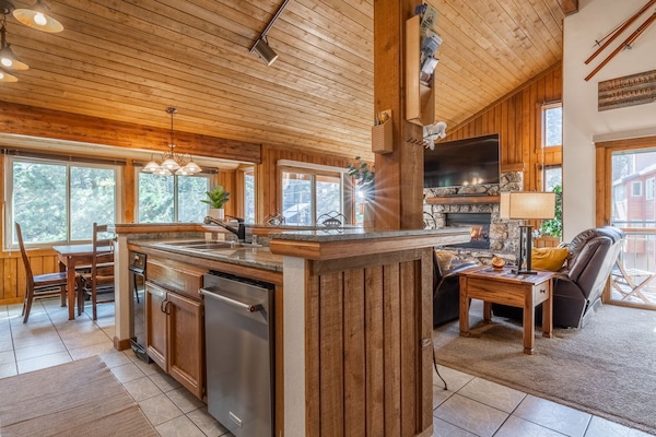 Open Kitchen adjacent to the Dining table and Livingroom