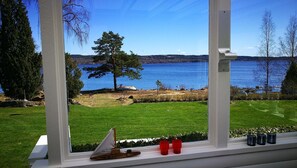 Enjoy breathtaking views of the serene lake and lush surroundings from the comfort of your room.