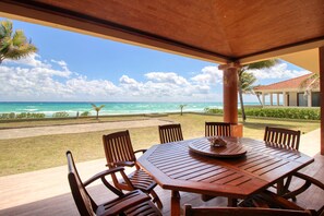 Outdoor dining - Luxury Beachfront Escape with Ocean Views, Private Pool, & High-Speed WiFi (Playa del Carmen)