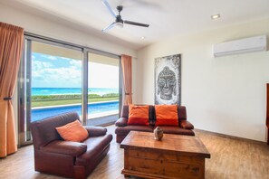 TV, foosball - Luxury Beachfront Escape with Ocean Views, Private Pool, & High-Speed WiFi (Playa del Carmen)