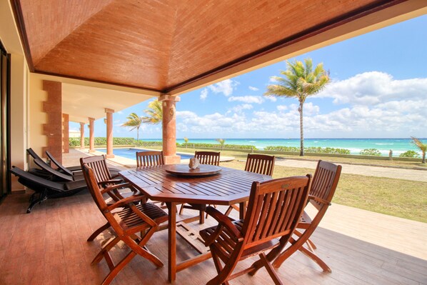 Outdoor dining - Luxury Beachfront Escape with Ocean Views, Private Pool, & High-Speed WiFi (Playa del Carmen)