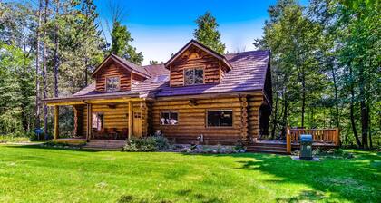 Waterfront home on Betsie River with hot tub & sauna near skiing at Crystal Mtn