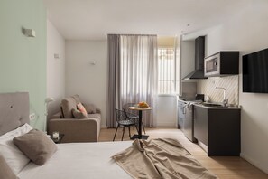 Family Studio, Terrace | Laptop workspace, free WiFi, bed sheets - Apartamentos Líbere Valencia Jardín Botánico (Valencia)