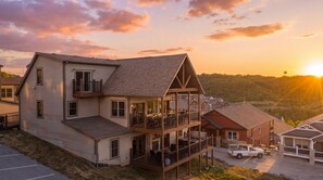 A two-story house with a balcony, a deck, and a driveway. - Crown Jewel / Table Rock Lake Views / Near Silver Dollar City / NEWLY REMODELED (Indian Point)
