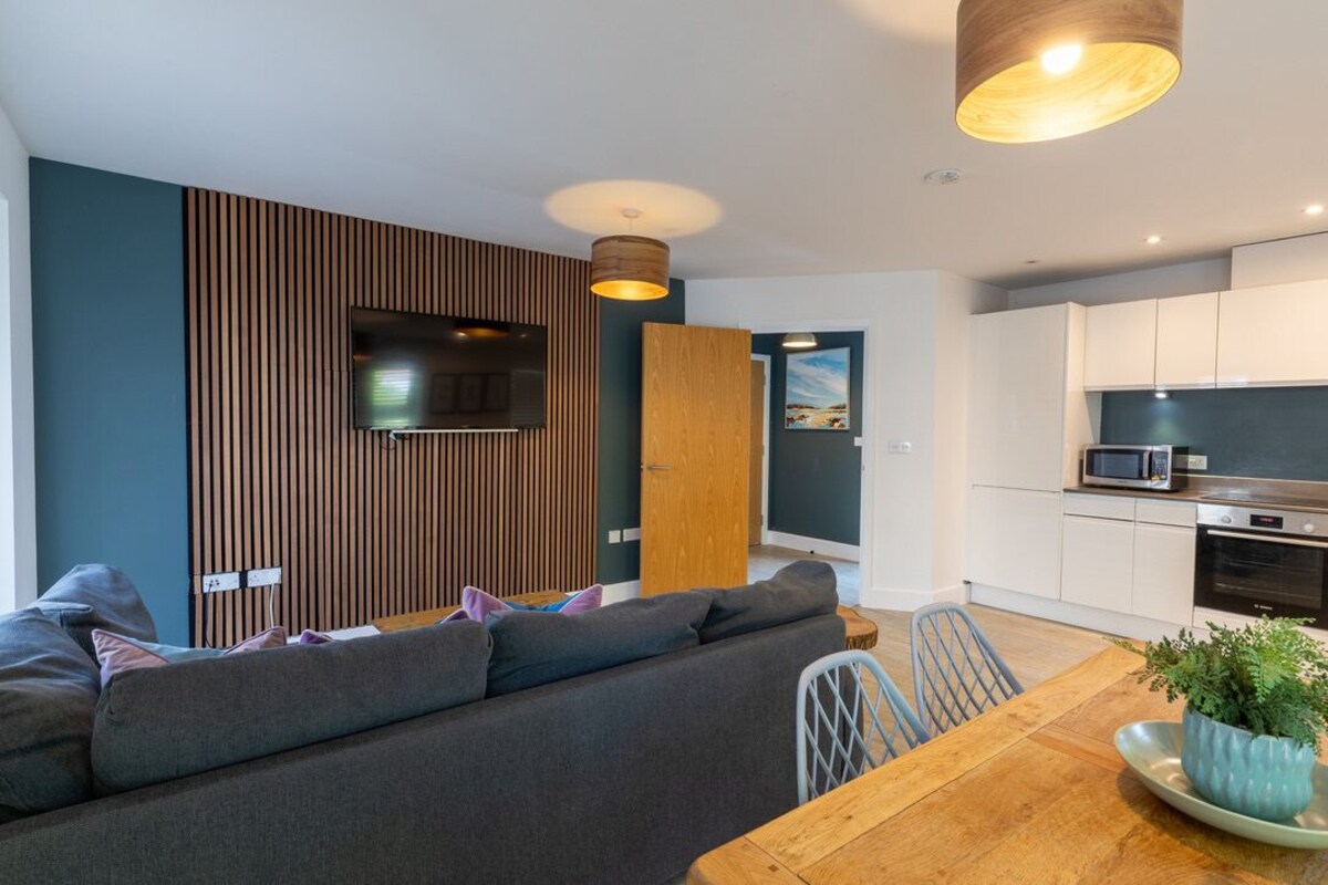 Appartement Design, accessible aux personnes à mobilité réduite (Orchard Point) | Bar-salon