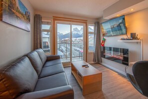 TV, fireplace - Top-Floor Condo | 2BR + AC with Mountain Views (Canmore)