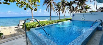 Beautiful 4-bed, 4-bath oceanfront home with a private pool and beach