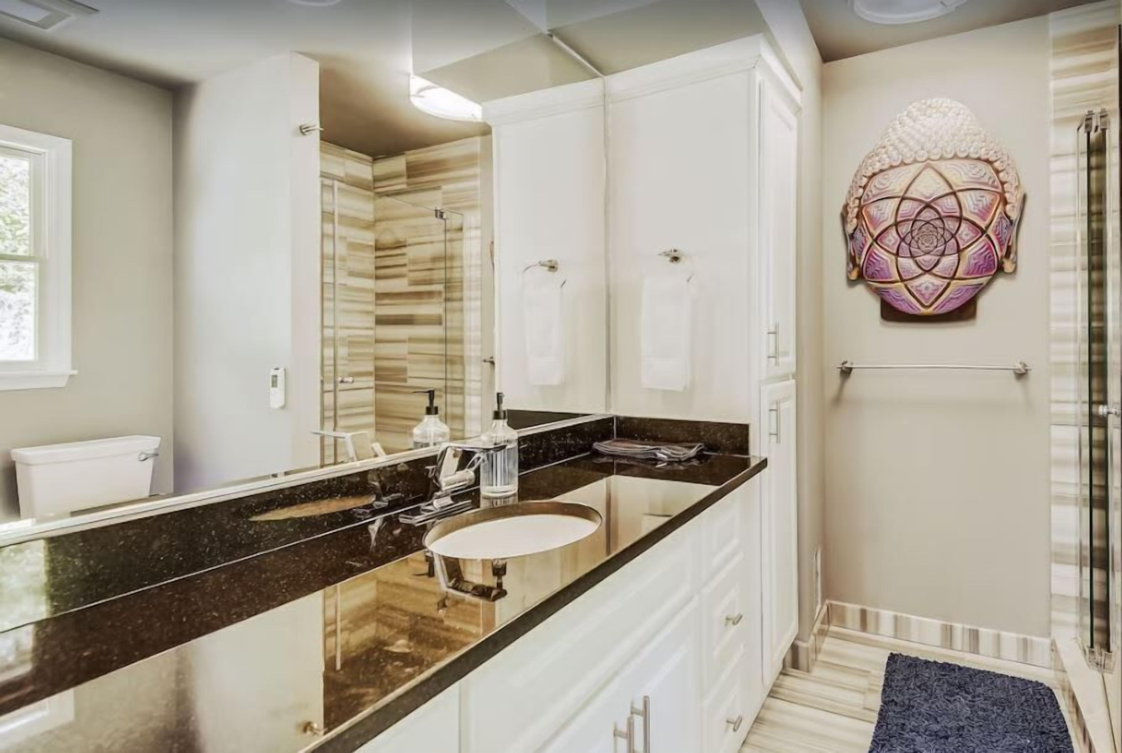 Combined shower/tub, hair dryer, towels, soap