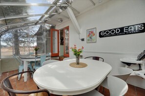 Glass-roofed sunroom with a dining table - Unique Getaway | Hot Tub & Waffle Breakfast! (Orem)
