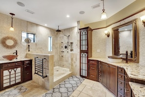 Combined shower/tub, hair dryer, towels, soap