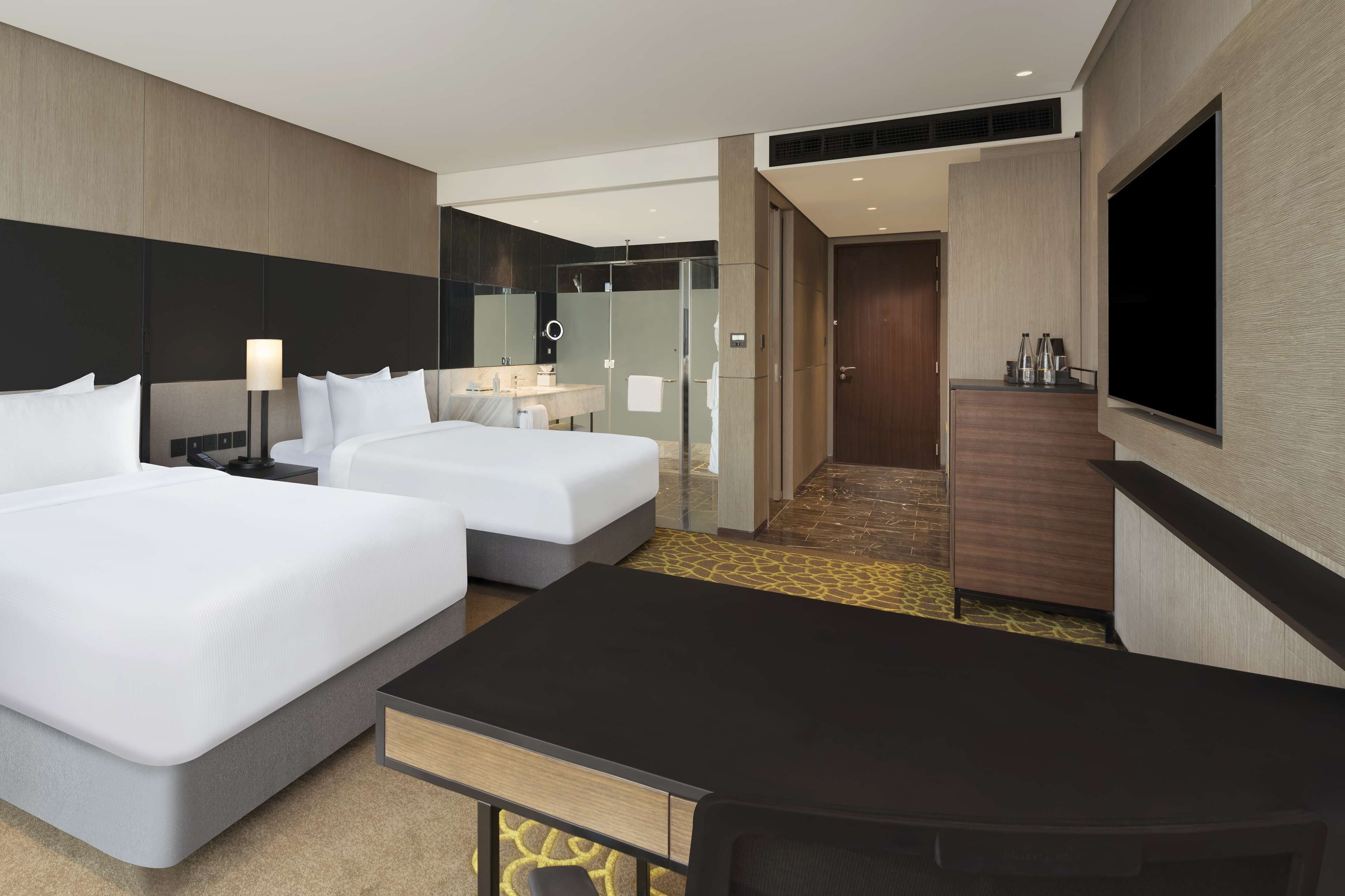 Premium bedding, pillow-top beds, minibar, in-room safe