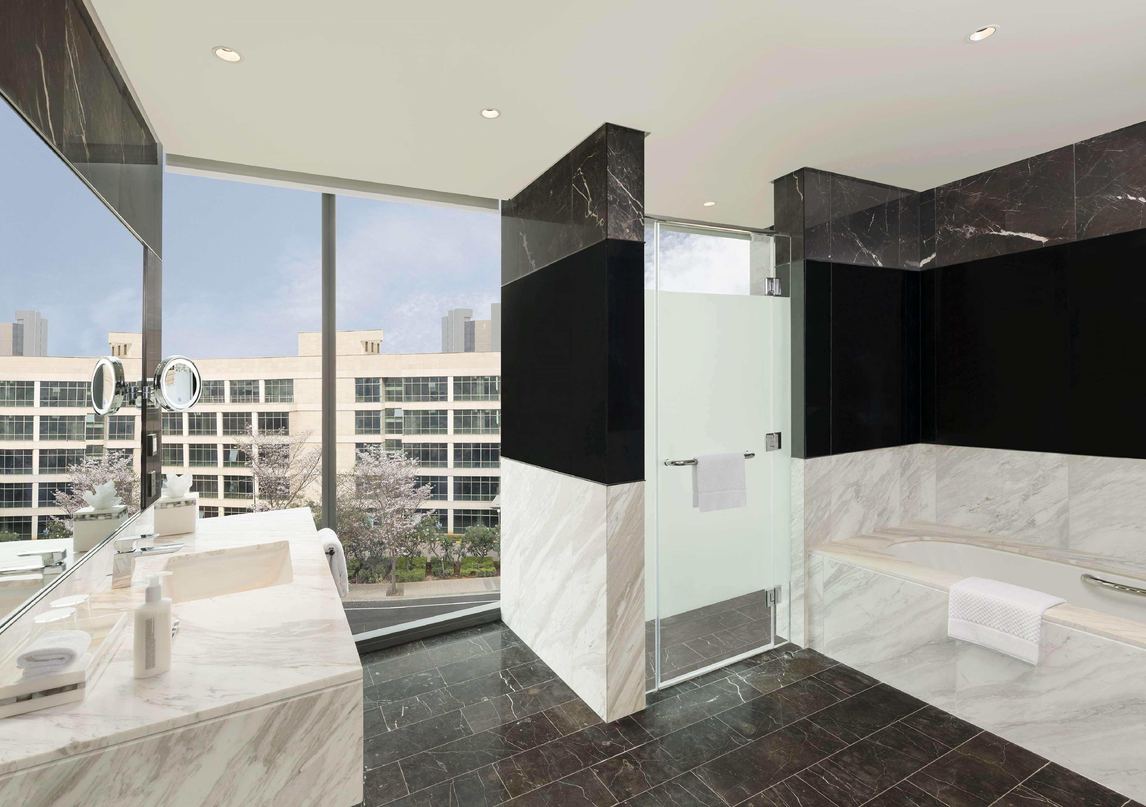 Designer toiletries, hair dryer, bathrobes, slippers