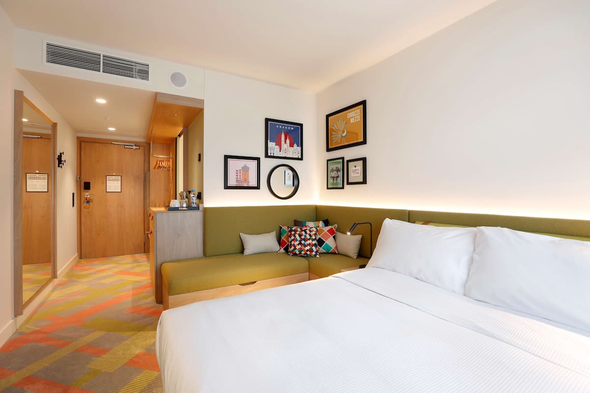 room, 1 queen bed with sofa bed | living area | 49-inch led tv with digital channels, tv