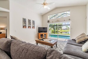 TV, offices - Turtle Lake - Inspiring Lake Views with Heated Pool by The Bay & Key Collection (Bradenton)