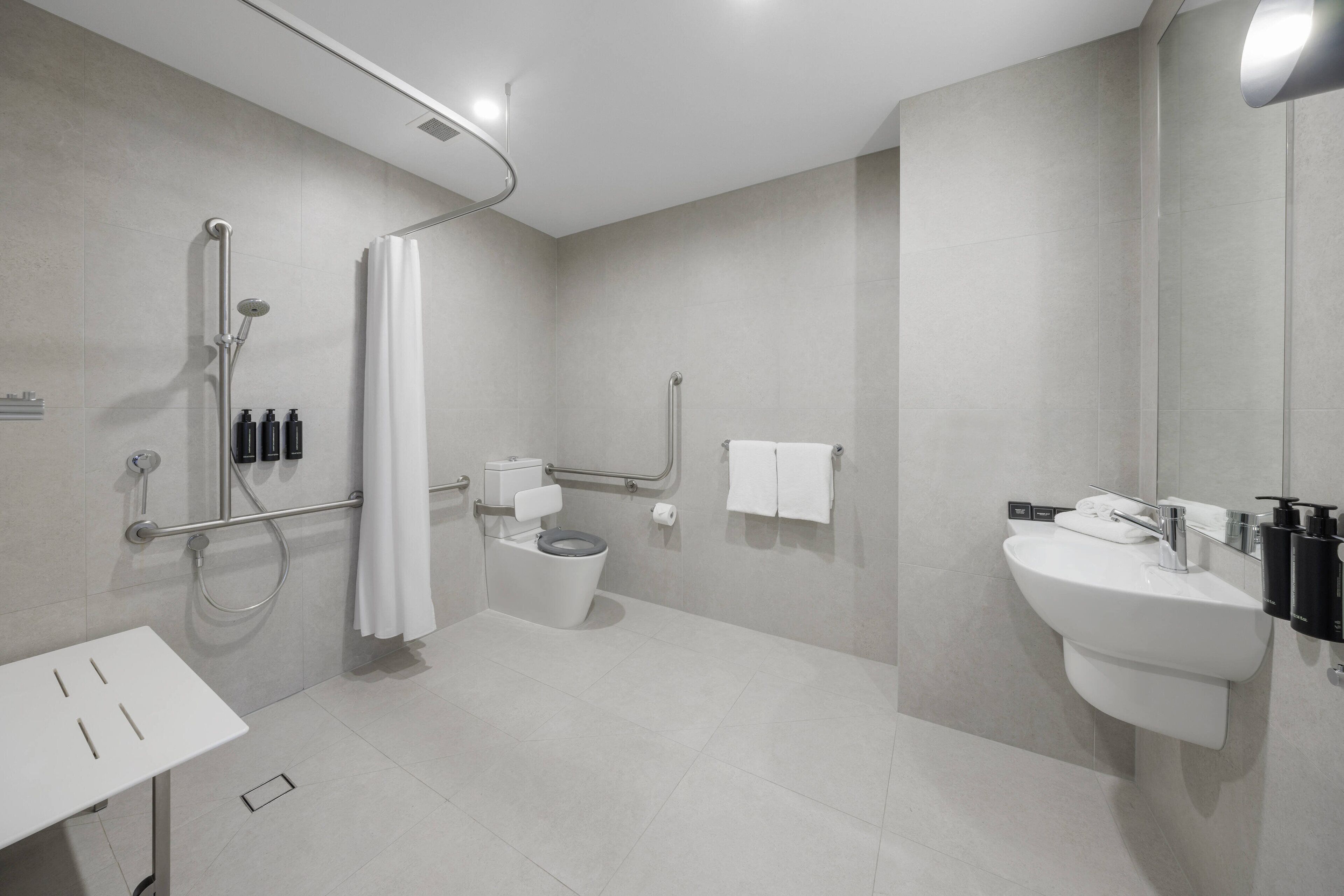 shower, eco-friendly toiletries, hair dryer, towels