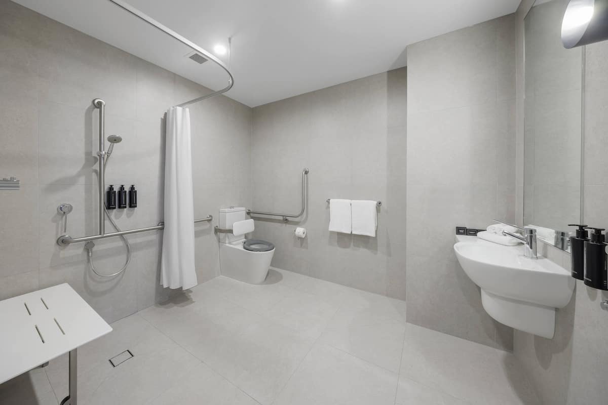 shower, eco-friendly toiletries, hair dryer, towels