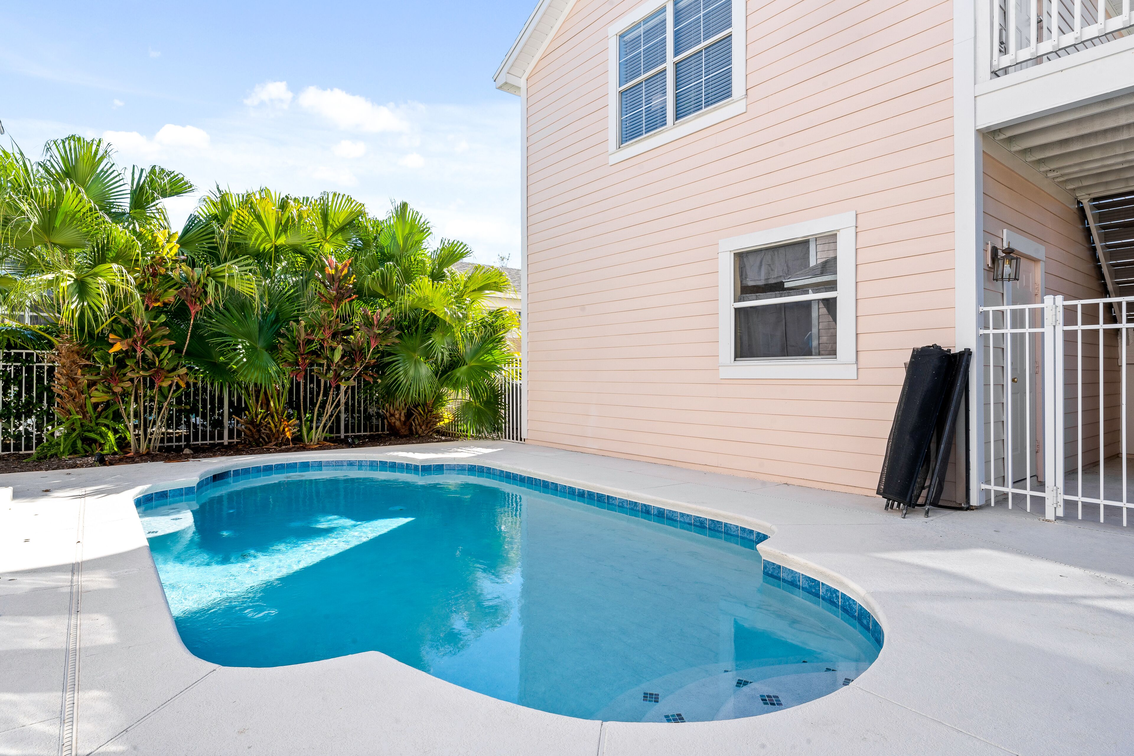 A heated pool, pool loungers