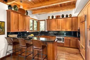 Beautifully crafted kitchen, hardwood floors and gorgeous view greet you as you enter this amazing vacation rental.