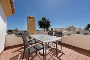 Outdoor dining - "Beautiful Townhouse Beachfront" with Sea View, Shared Pool, A/C, Wi-Fi (Marbella)