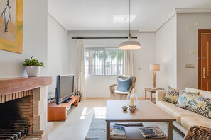 TV, fireplace - "Beautiful Townhouse Beachfront" with Sea View, Shared Pool, A/C, Wi-Fi (Marbella)
