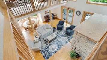 TV, fireplace, books