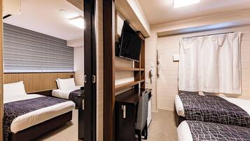 Down duvets, desk, laptop workspace, blackout curtains