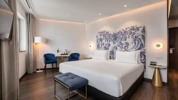 Hypoallergeen beddengoed, een minibar, een bureau, een laptopwerkplek