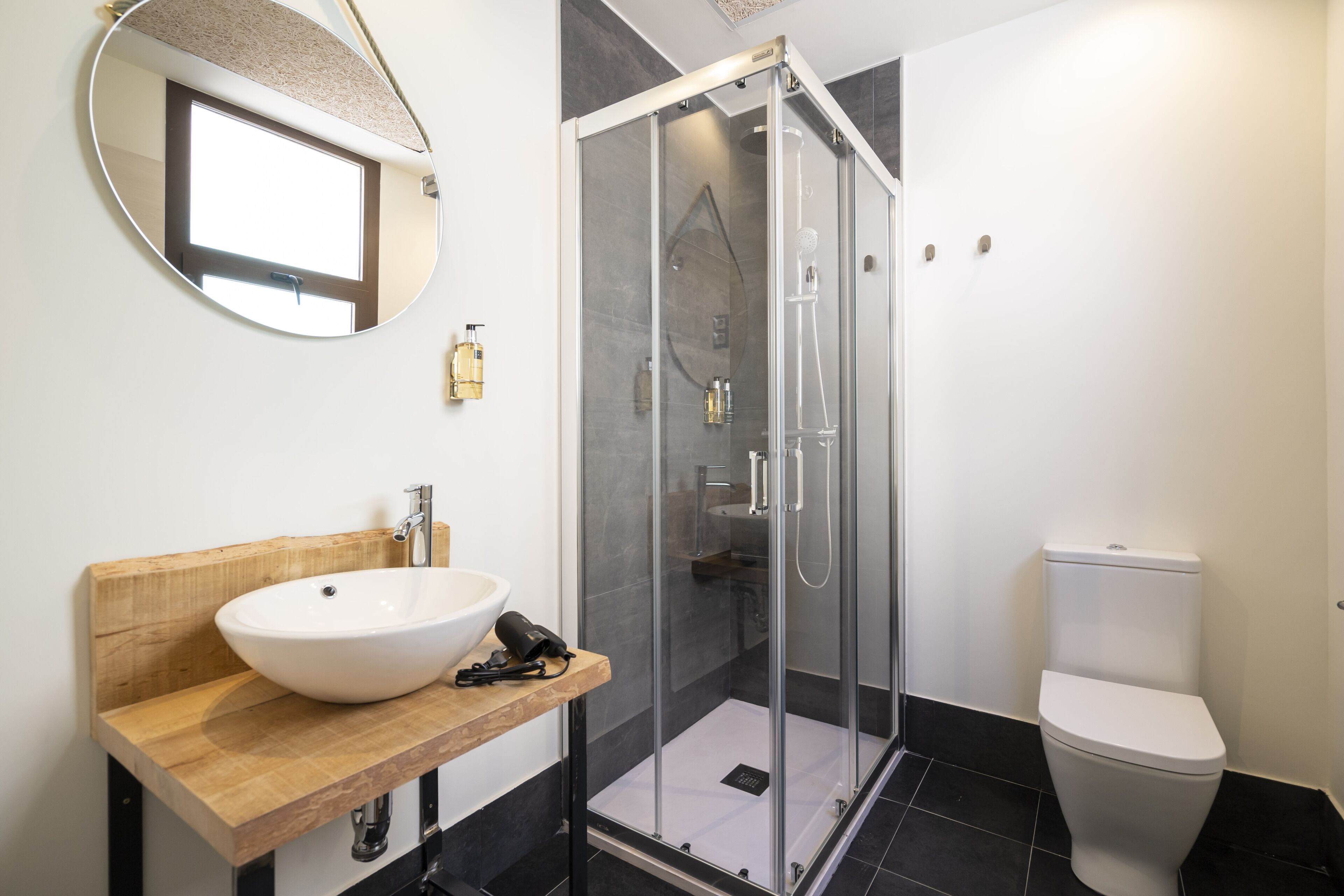 basic single room | bathroom | shower, hair dryer, towels, soap