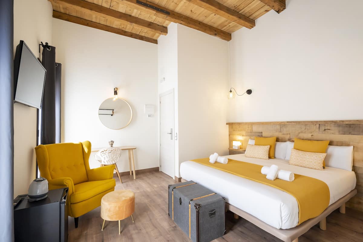 Deluxe kamer, balkon | Verduisterende gordijnen, beddengoed