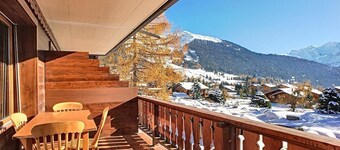 Living room with sofa-bed, one eating corner, a fire place, separated kitchen with dishwasher and Ne