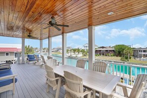 Outdoor dining - Waterfront Creek Front Home w/ Pool & Private Dock for 20 Guests (Garden City Beach)
