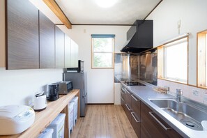 Fridge, microwave, stovetop, cookware/dishes/utensils