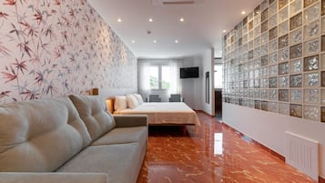 Suite estudio Premium | Edredones de plumas, decoración individual, mobiliario individual
