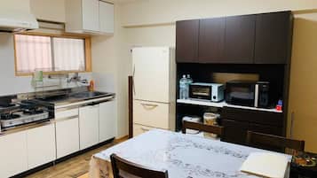 Fridge, microwave, stovetop, cookware/dishes/utensils