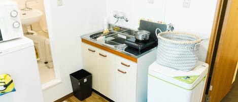Fridge, microwave, cookware/dishes/utensils