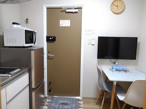 Fridge, microwave, cookware/dishes/utensils